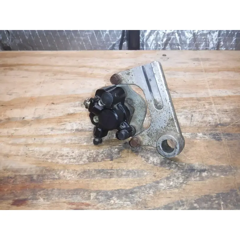 1988 Rm125 Rear Brake Caliper Holder Spacer
